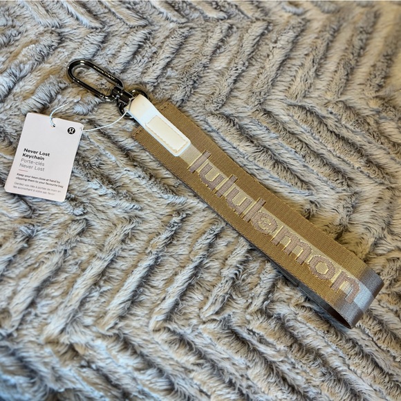 lululemon athletica Accessories - Lululemon Gold & White Keychain Strap